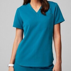 Fabletics Vital 1-Pocket Scrub Top Caribbean Blue XXS NWT